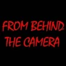From behind the camera